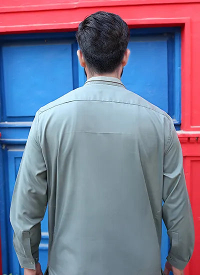 Back view of the men’s green muted kurta shalwar, highlighting the straight-cut design and smooth fabric finish.